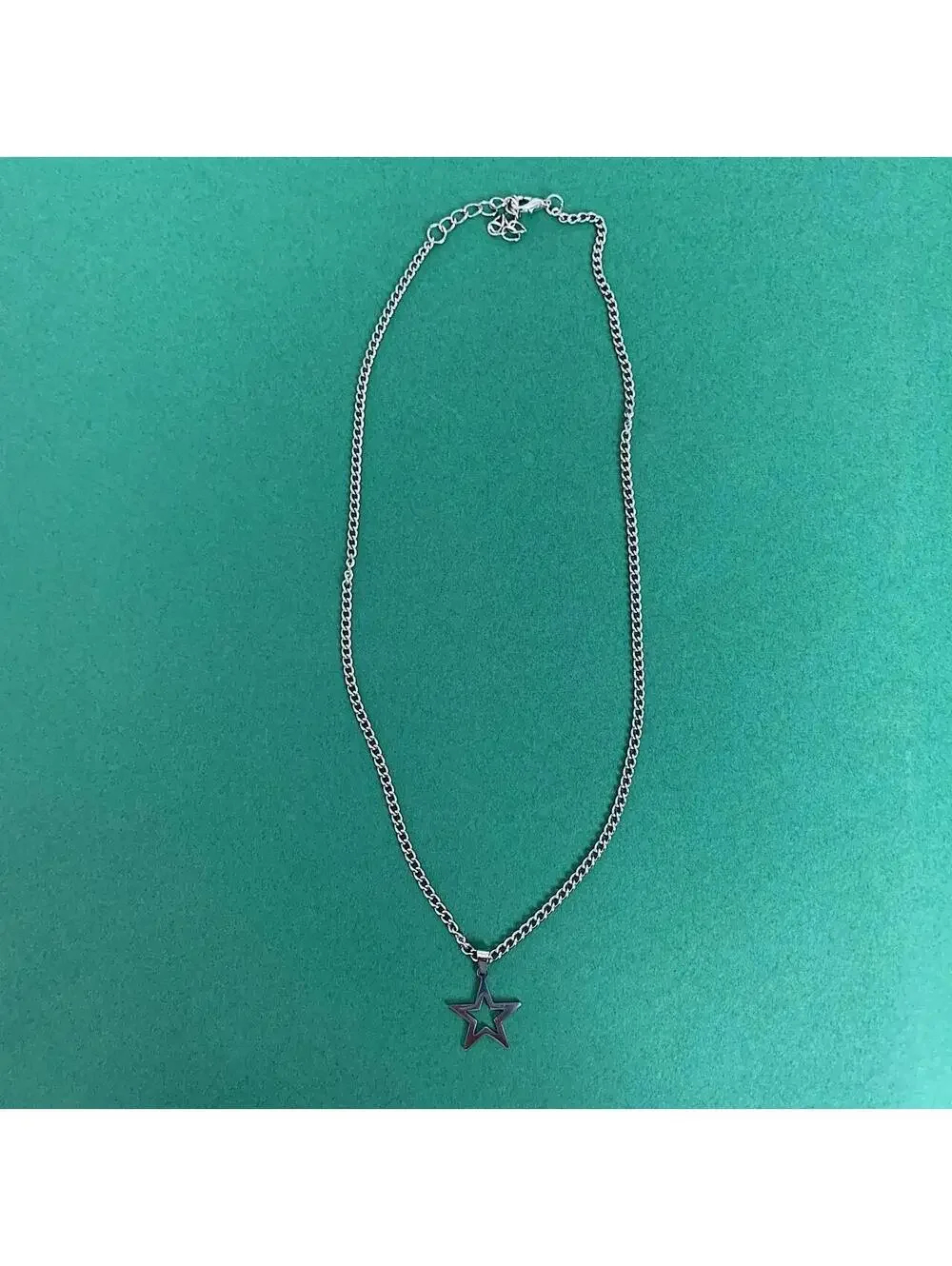 Cyber Y2k simplistic grunge silver star opium necklace. Cool simple design